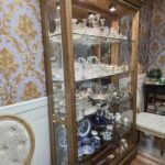 Queen Anne Revival writing desk and chair set with cabriole legs, carved shell motif, and upholstered seat — vintage hardwood furniture.